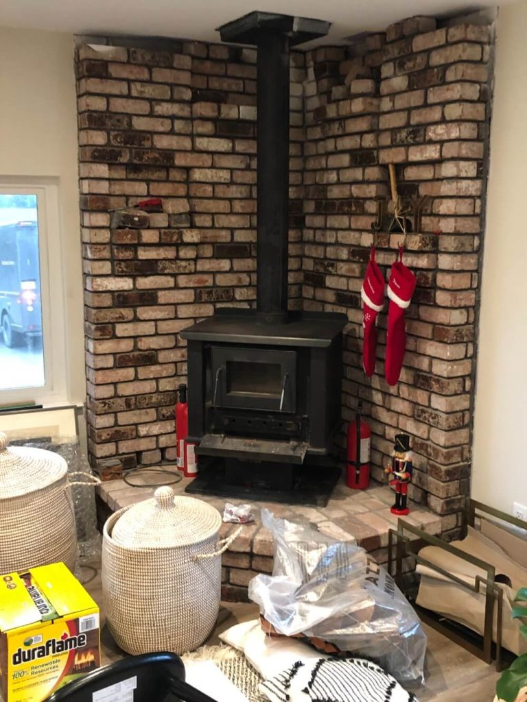 photo gallery Before the bricks and pot belly stove are painted 10914